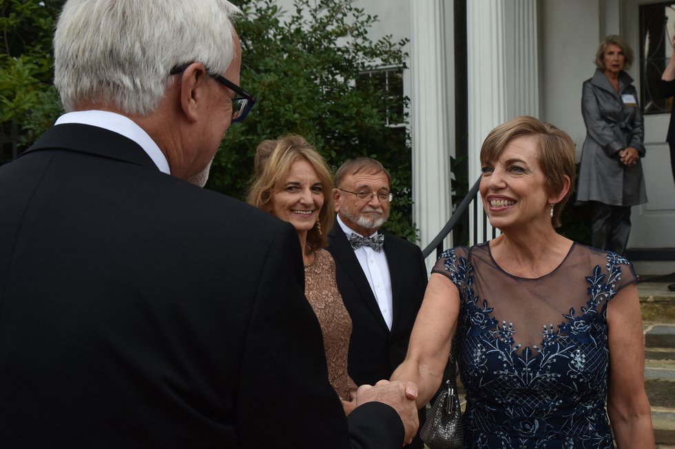Beth Tuttle greets Jakob Evans and Mickey and Vernon Olin..JPG